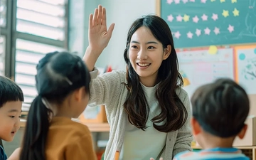 A kindergarten teacher is teaching the children.